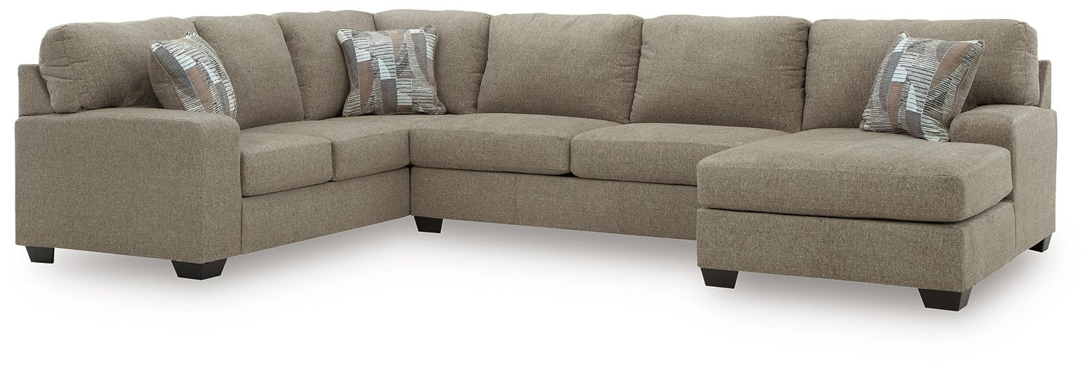 Newellen Sleeper Sectional with Chaise - Furniture Gallery