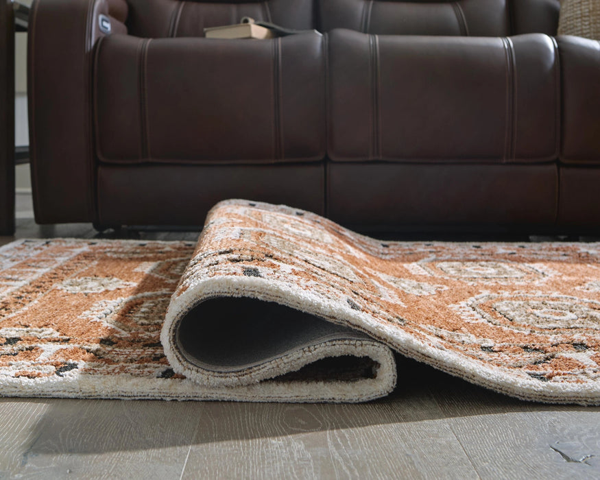 Qaabiz Area Rug