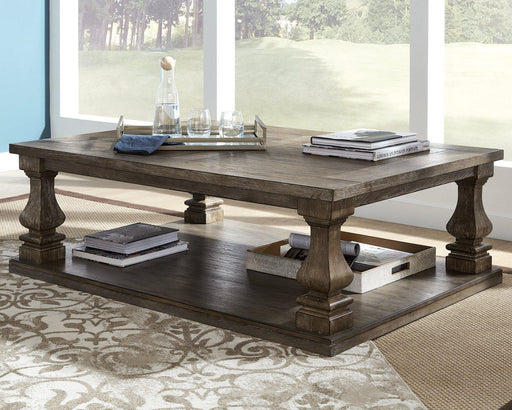 Johnelle Coffee Table - Furniture Gallery