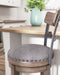 Caitbrook Counter Height Bar Stool - Furniture Gallery