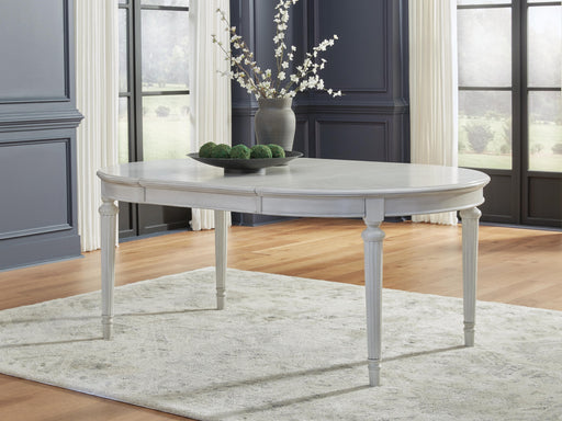Montelaine Dining Extension Table - Furniture Gallery