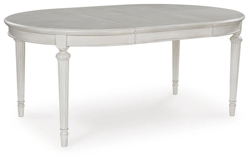 Montelaine Dining Extension Table - Furniture Gallery