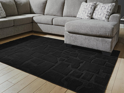 Gibbswell Washable 5' x 7' Area Rug - Furniture Gallery